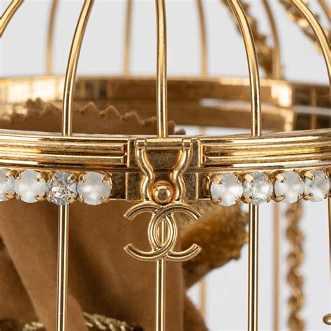 chanel bird cage|chandelier with branches and birds.